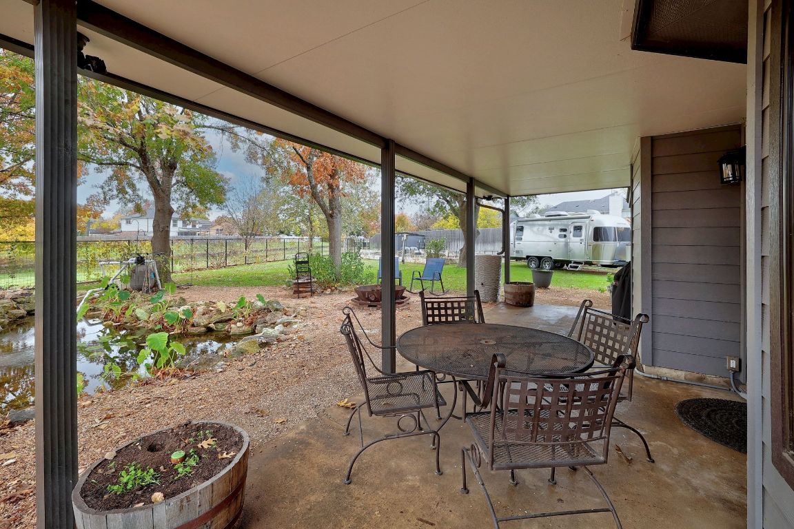 2307 Silverleaf Cove Round Rock, TX 78664 - Photo 21 of 31 a view of a dining room with furniture window and outside view