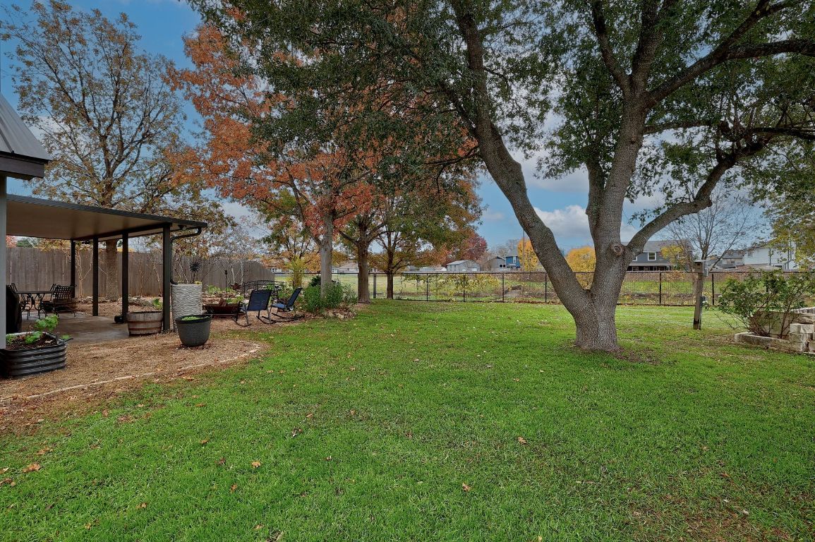 2307 Silverleaf Cove Round Rock, TX 78664 - Photo 25 of 31 a view of a park with bench and trees