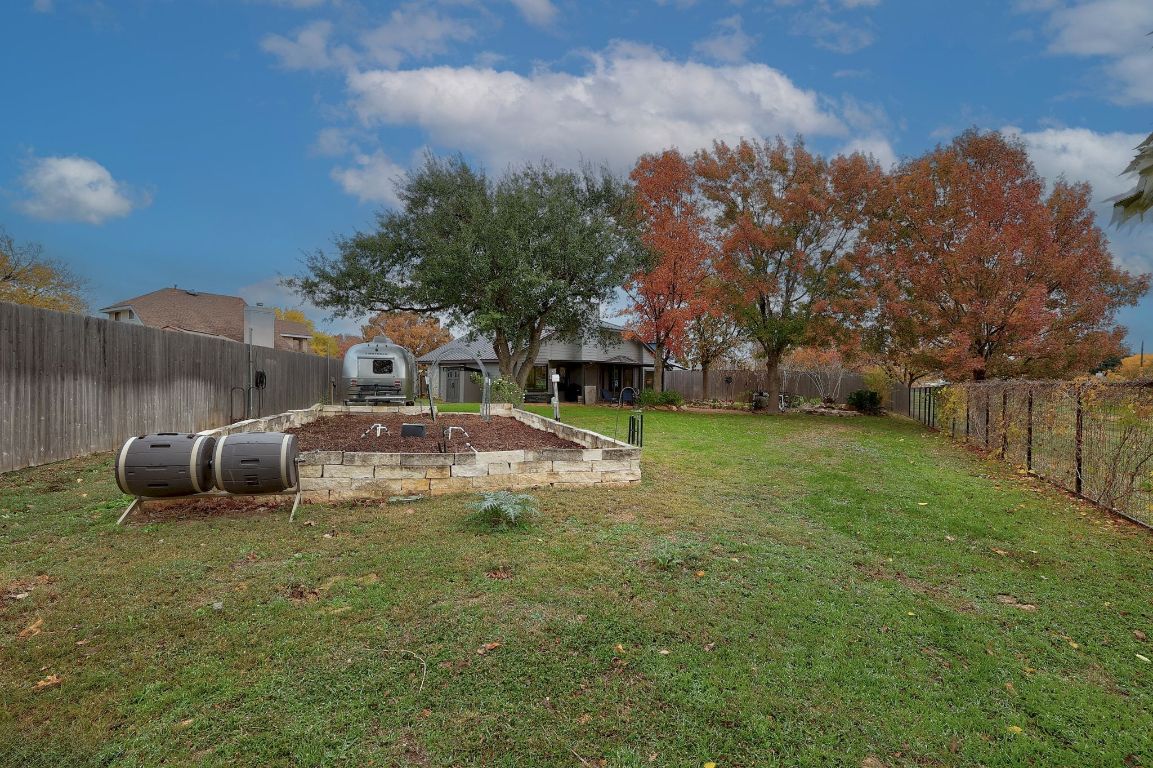 2307 Silverleaf Cove Round Rock, TX 78664 - Photo 27 of 31 a view of a garden with an outdoor space