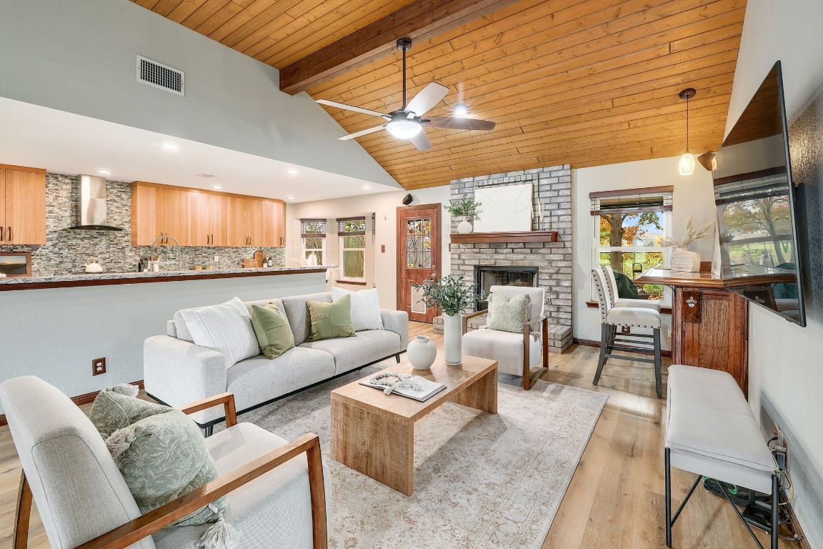 2307 Silverleaf Cove Round Rock, TX 78664 - Photo 5 of 31 a living room with furniture kitchen view and a large window