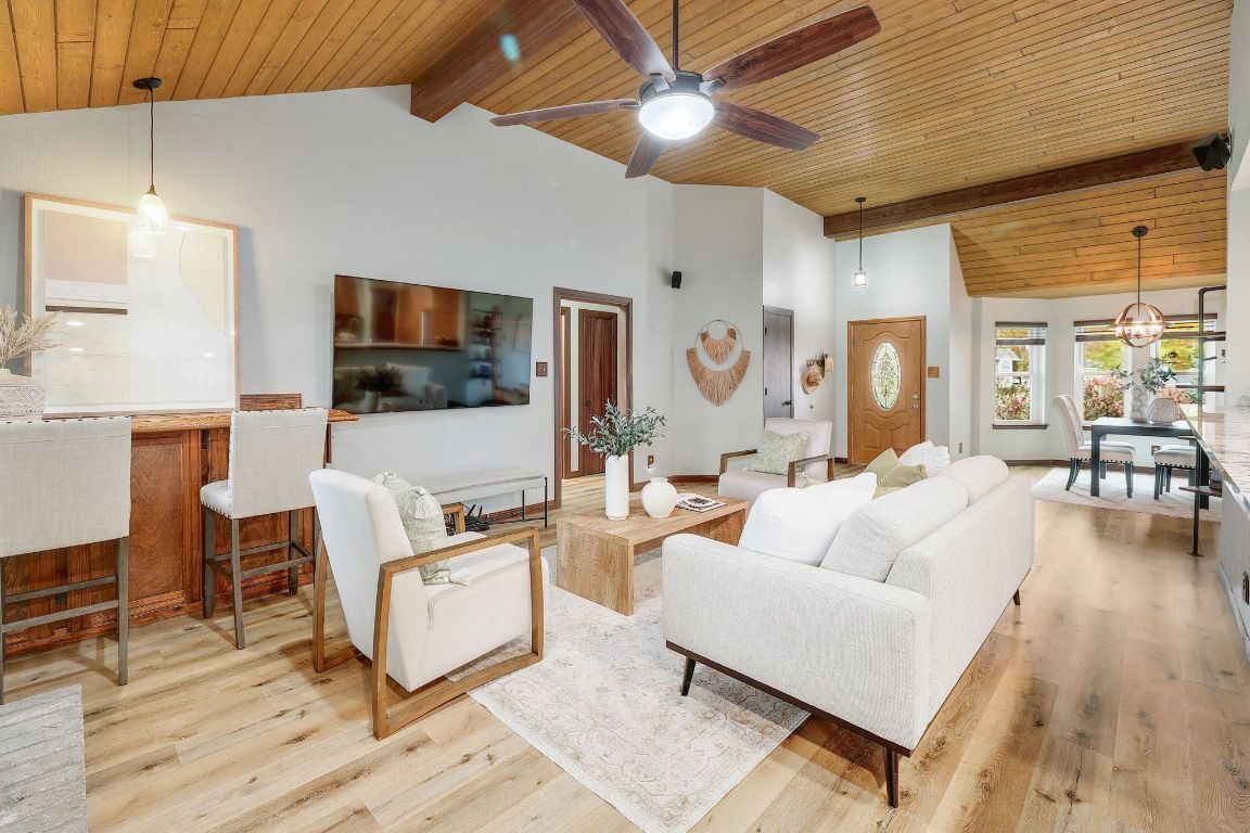 2307 Silverleaf Cove Round Rock, TX 78664 - Photo 7 of 31 a living room with furniture and a flat screen tv