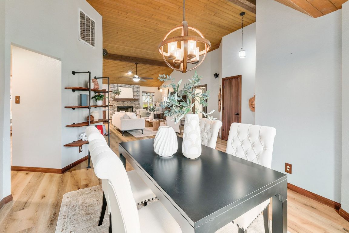 2307 Silverleaf Cove Round Rock, TX 78664 - Photo 9 of 31 a view of kitchen and dining area with chandelier