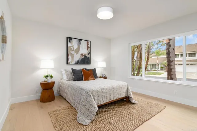 a bathroom with a double vanity sink toilet and shower