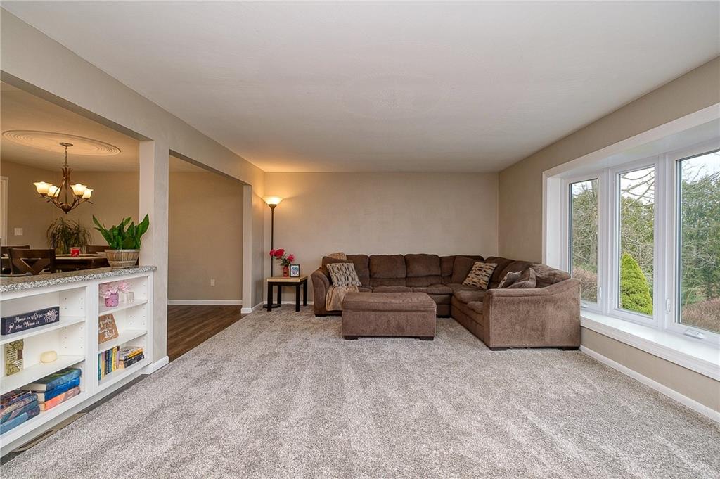 13730 Ridge Road North Huntingdon, PA 15642 - Photo 6 of 24 a living room with furniture and a large window