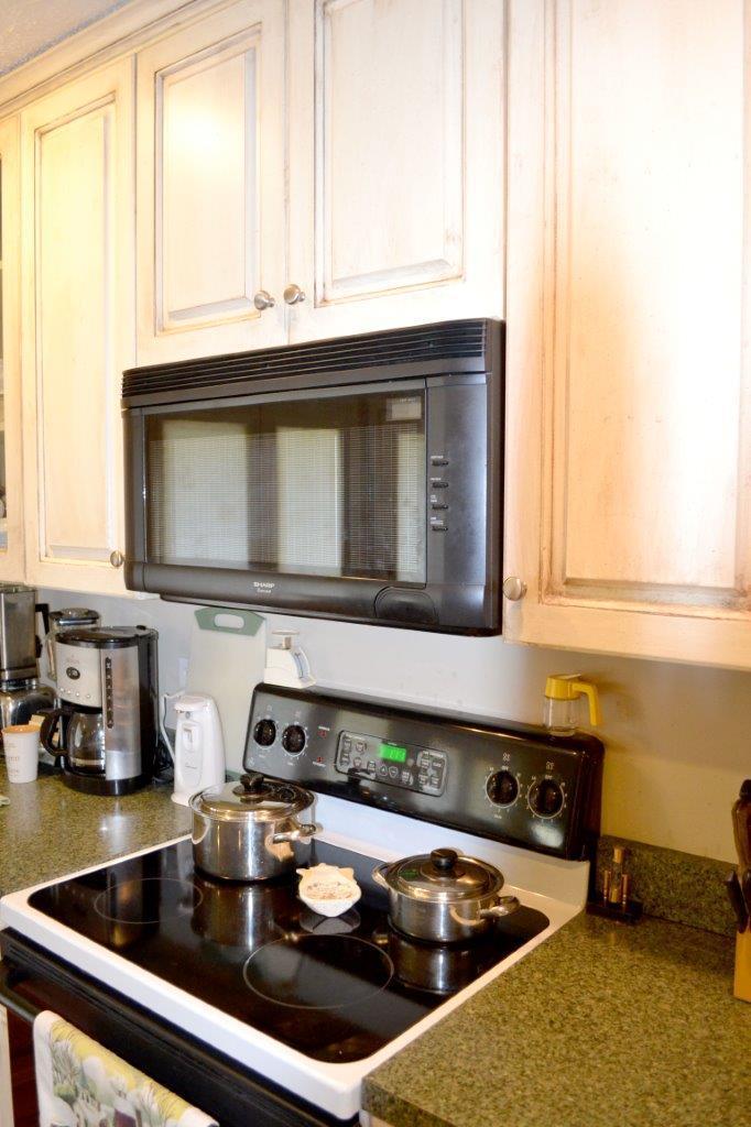 2588 Iron Ridge Road Rocky Mount, VA 24151 - Photo 24 of 65 a kitchen with a stove and a sink