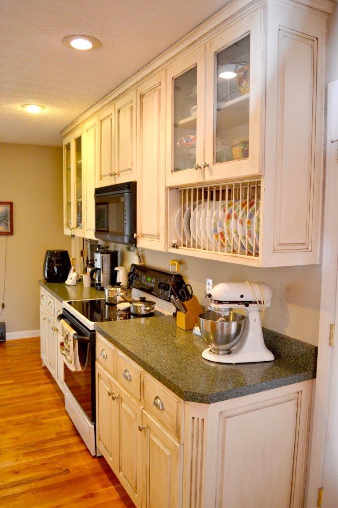 2588 Iron Ridge Road Rocky Mount, VA 24151 - Photo 27 of 65 a kitchen with a sink stove top oven and microwave