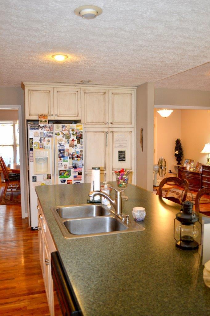 2588 Iron Ridge Road Rocky Mount, VA 24151 - Photo 29 of 65 a kitchen with stainless steel appliances granite countertop a sink counter space and cabinets