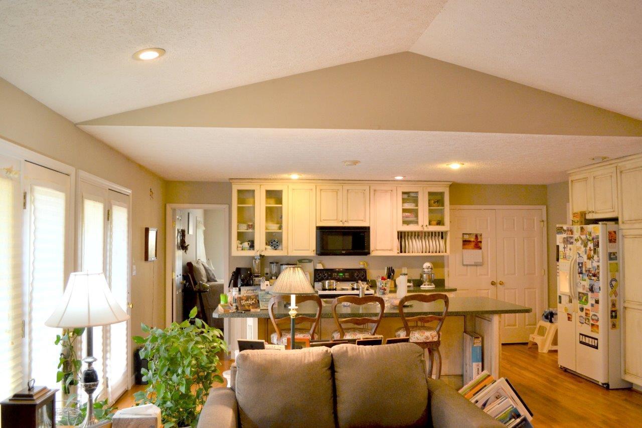 2588 Iron Ridge Road Rocky Mount, VA 24151 - Photo 30 of 65 a living room with furniture fireplace and flat screen tv
