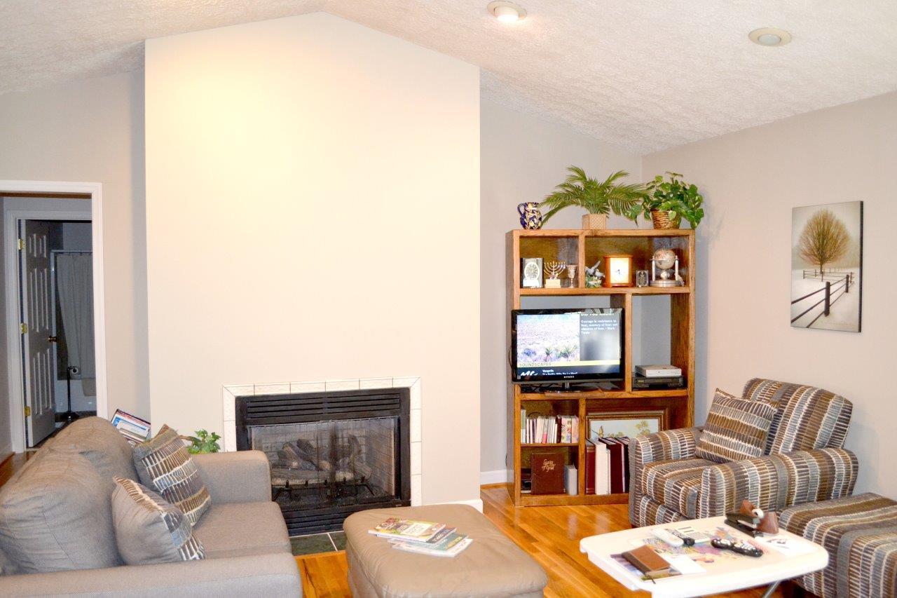 2588 Iron Ridge Road Rocky Mount, VA 24151 - Photo 36 of 65 a living room with furniture and a fireplace