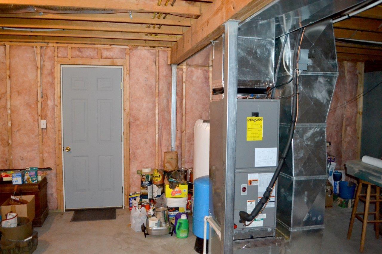 2588 Iron Ridge Road Rocky Mount, VA 24151 - Photo 46 of 65 a view of walk in closet with clothes and shoes