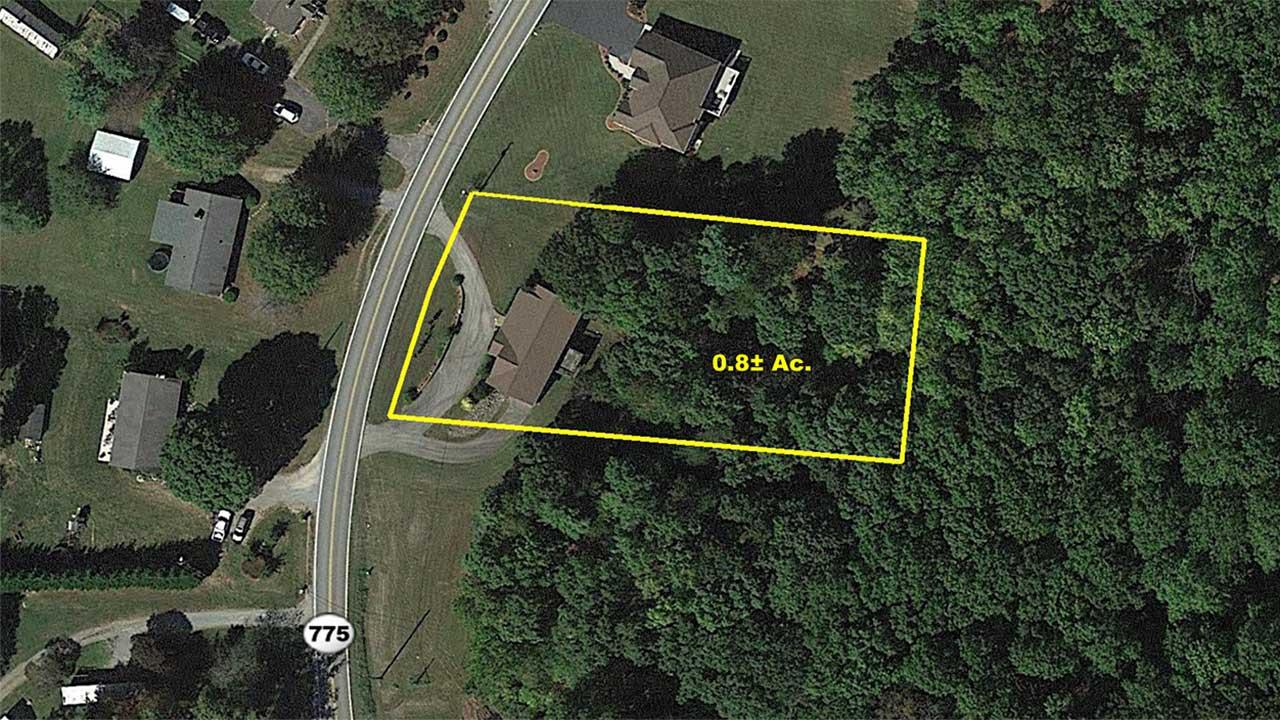 2588 Iron Ridge Road Rocky Mount, VA 24151 - Photo 64 of 65 an aerial view of a house having yard