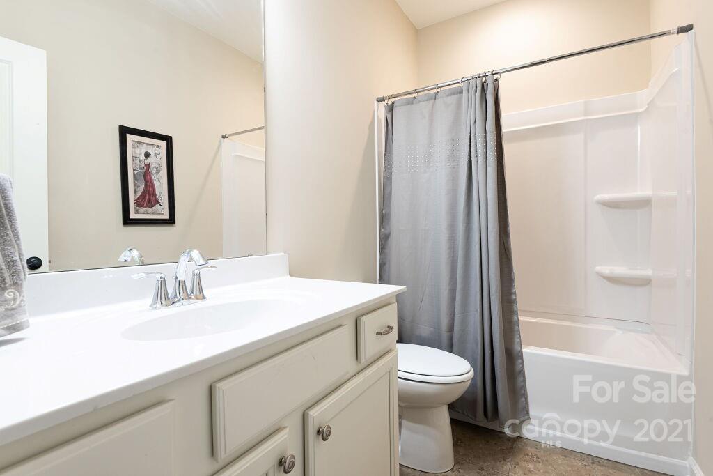 5232 Meadowcroft Way Fort Mill, SC 29708 - Photo 40 of 44 a bathroom with a sink a toilet and shower