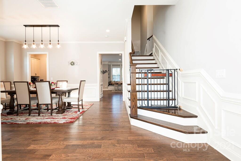 5232 Meadowcroft Way Fort Mill, SC 29708 - Photo 5 of 44 a view of a living room and kitchen with a table
