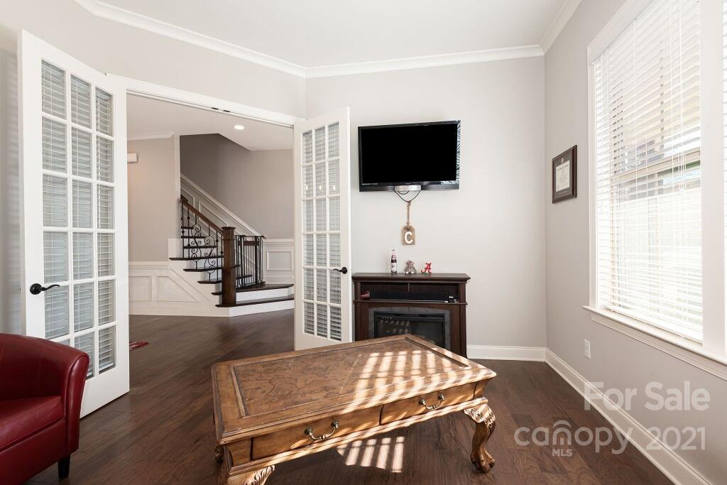 5232 Meadowcroft Way Fort Mill, SC 29708 - Photo 8 of 44 a living room with furniture and a flat screen tv
