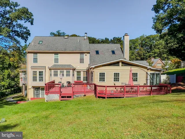 a front view of house with yard and seating area