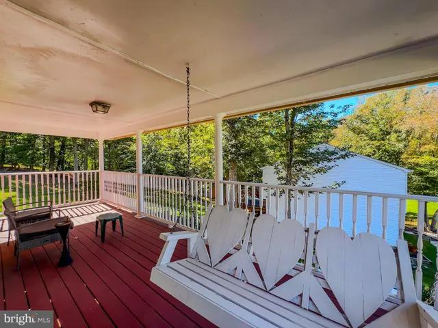 a view of a chair in wooden deck