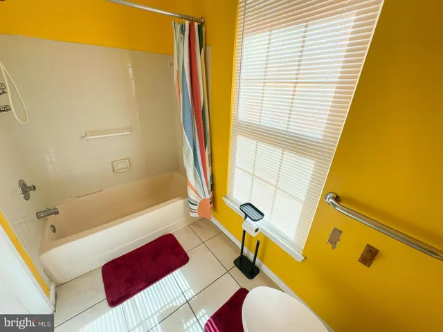 a bathroom with a sink and a bathtub