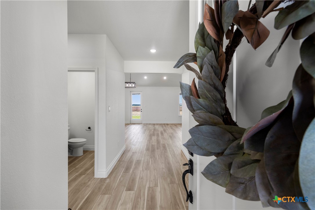 1823 Ember Drive Temple, TX 76502 - Photo 2 of 46 a view of entryway with wooden floor