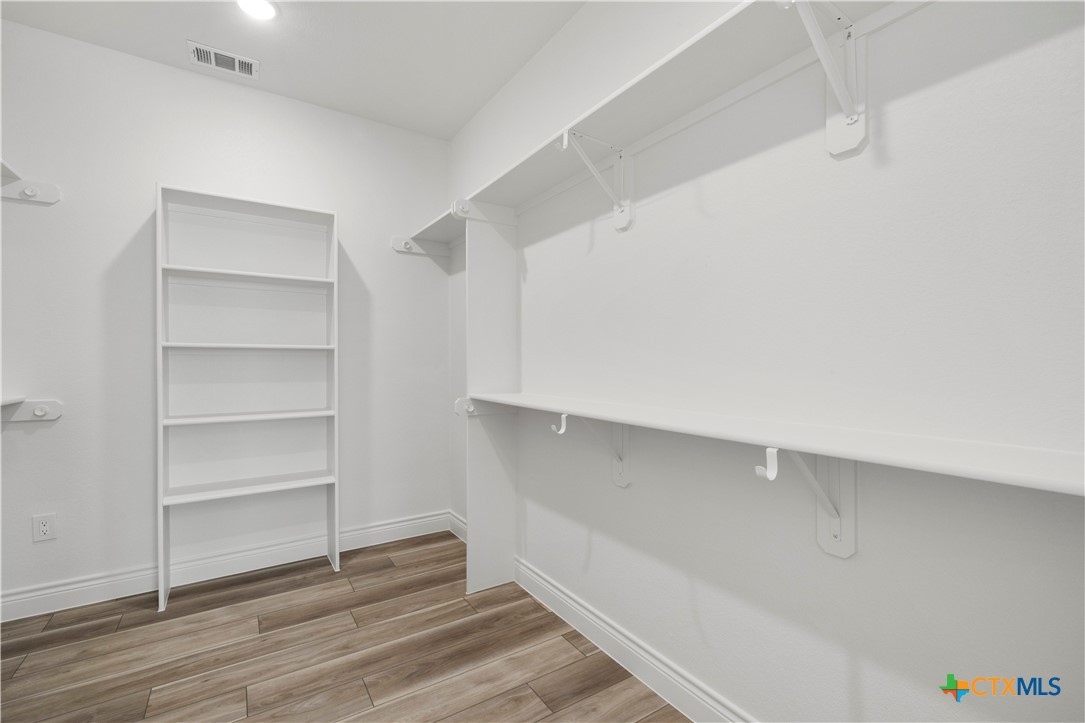 1823 Ember Drive Temple, TX 76502 - Photo 25 of 46 a view of an empty walk in closet