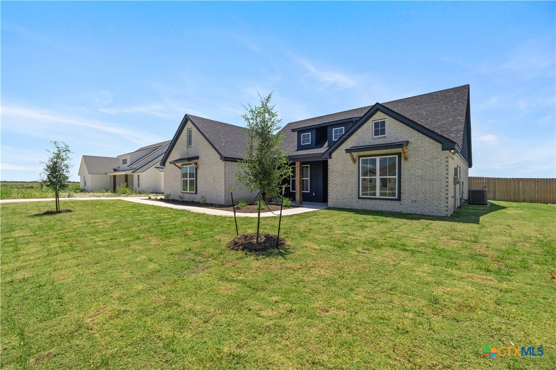1823 Ember Drive Temple, TX 76502 - Photo 43 of 46 a house with swimming pool in front of it