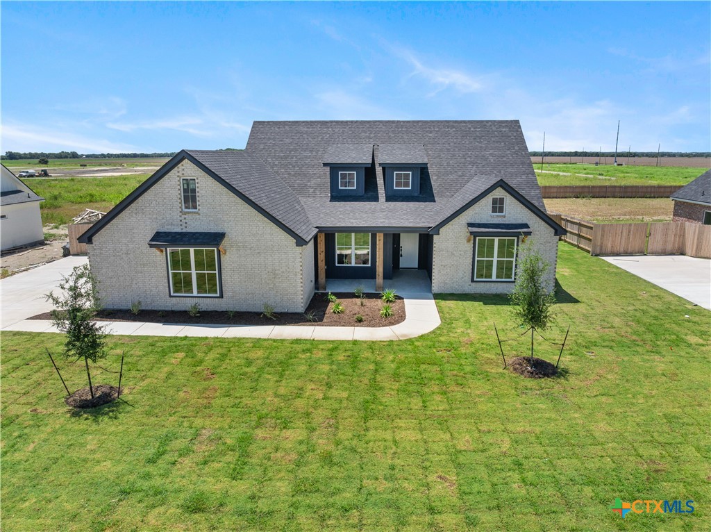 1823 Ember Drive Temple, TX 76502 - Photo 46 of 46 a front view of a house with a yard