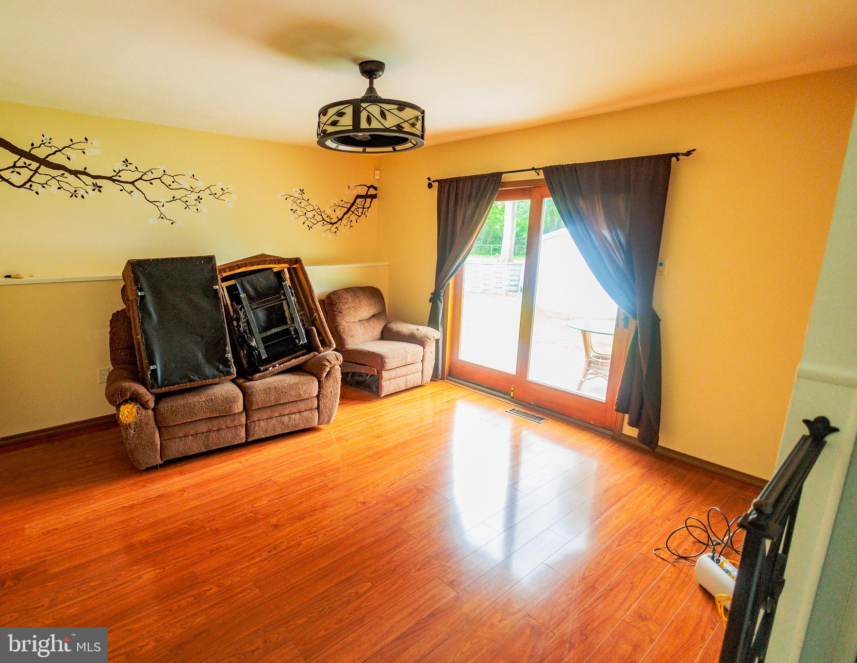 300 Macclelland Avenue Glassboro, NJ 08028 - Photo 18 of 39 a living room with a couch and a table