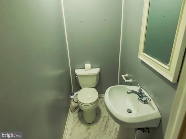 a bathroom with a sink and a toilet