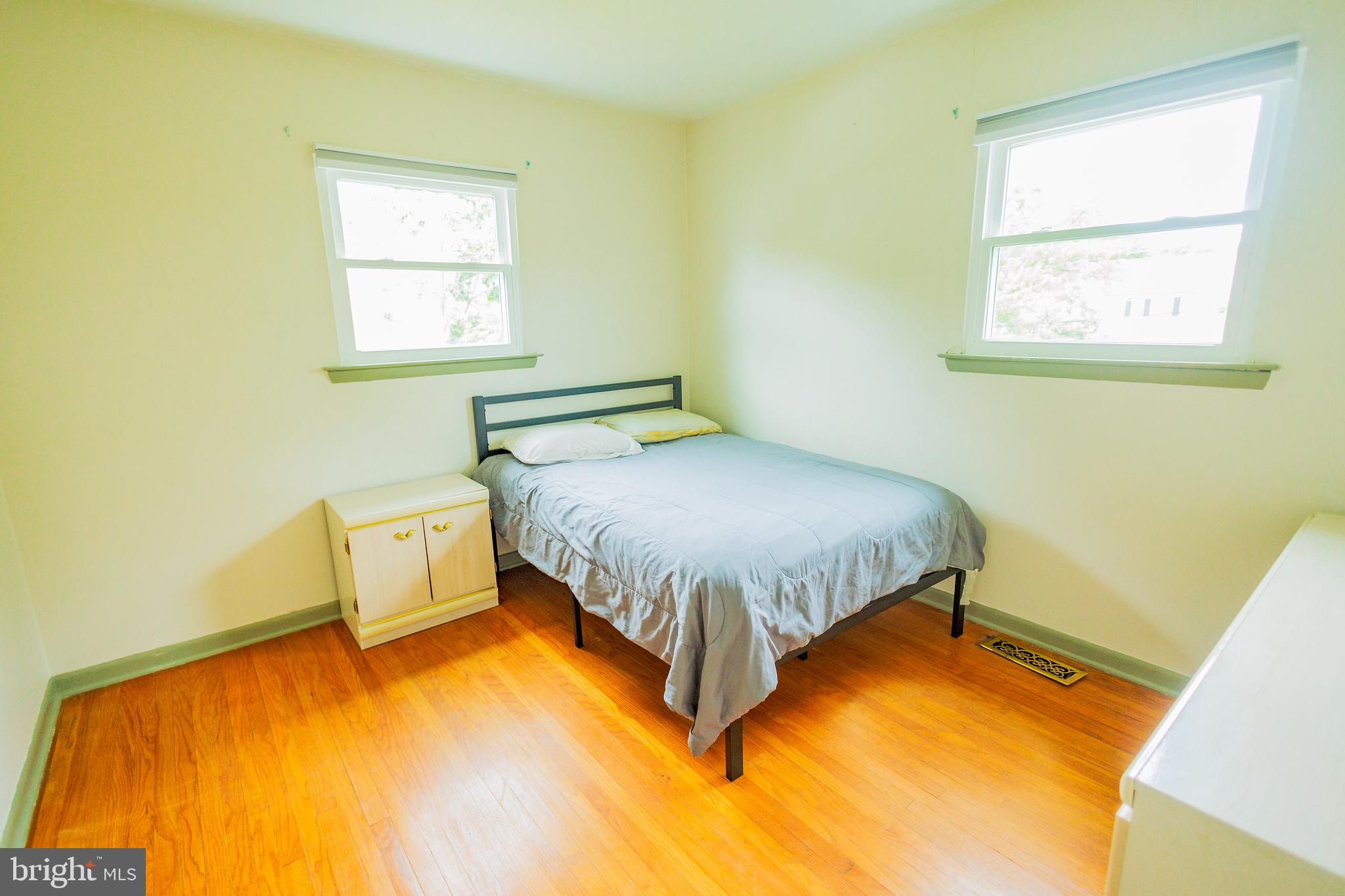 300 Macclelland Avenue Glassboro, NJ 08028 - Photo 29 of 39 a bedroom with a bed and a window