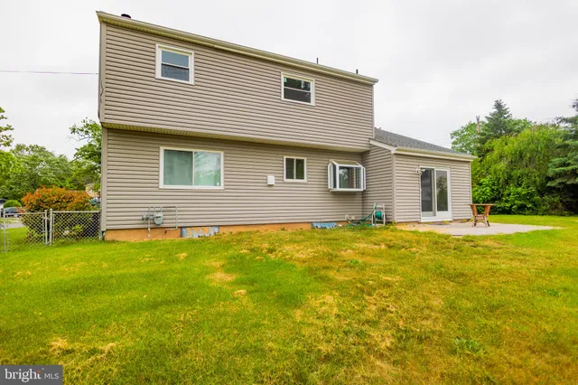 a front view of house with yard and porch