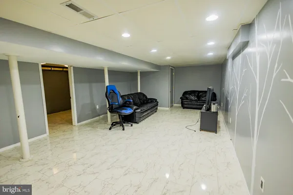 a view of a livingroom with furniture