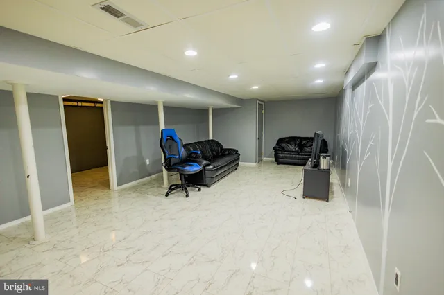 a view of a livingroom with furniture