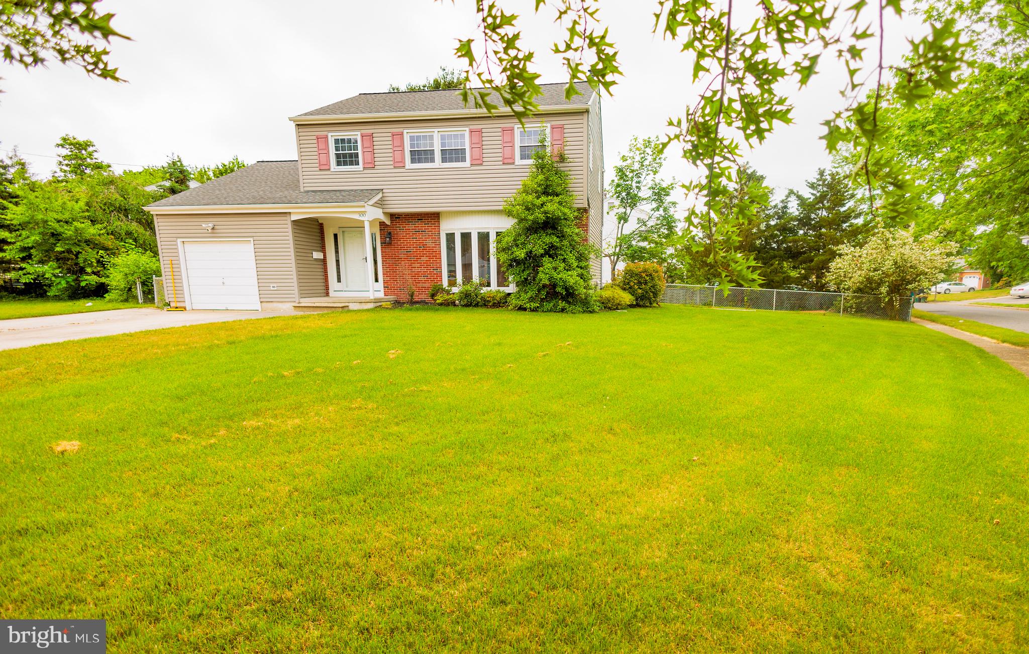 300 Macclelland Avenue Glassboro, NJ 08028 - Photo 5 of 39 a view of an house with swimming pool
