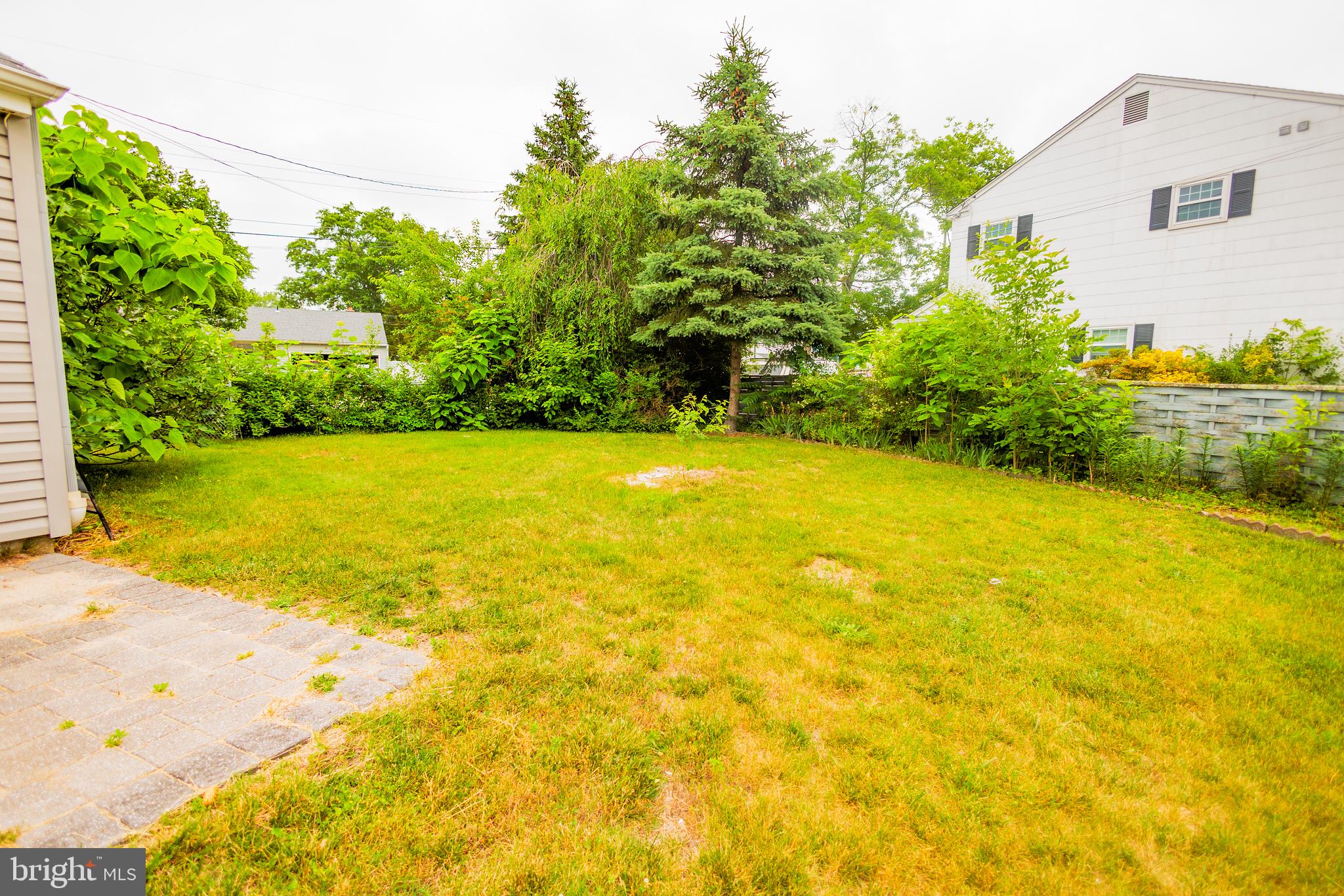 300 Macclelland Avenue Glassboro, NJ 08028 - Photo 7 of 39 a view of an ocean with a house in the background