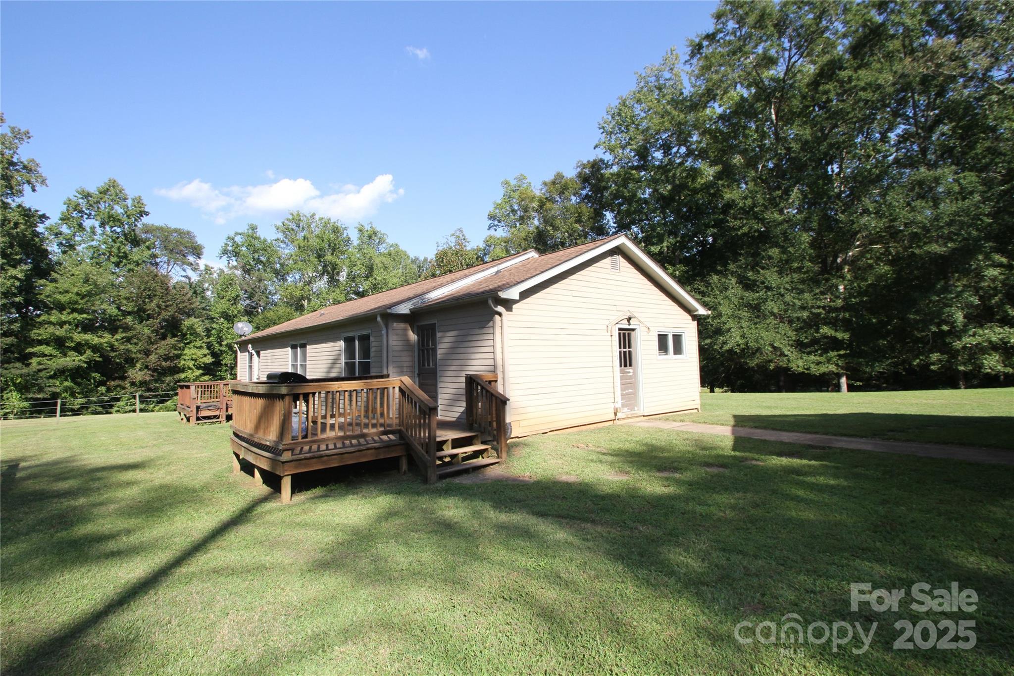 3744 Hunting Country Road Tryon, NC 28782 - Photo 3 of 34 a view of a house with a yard
