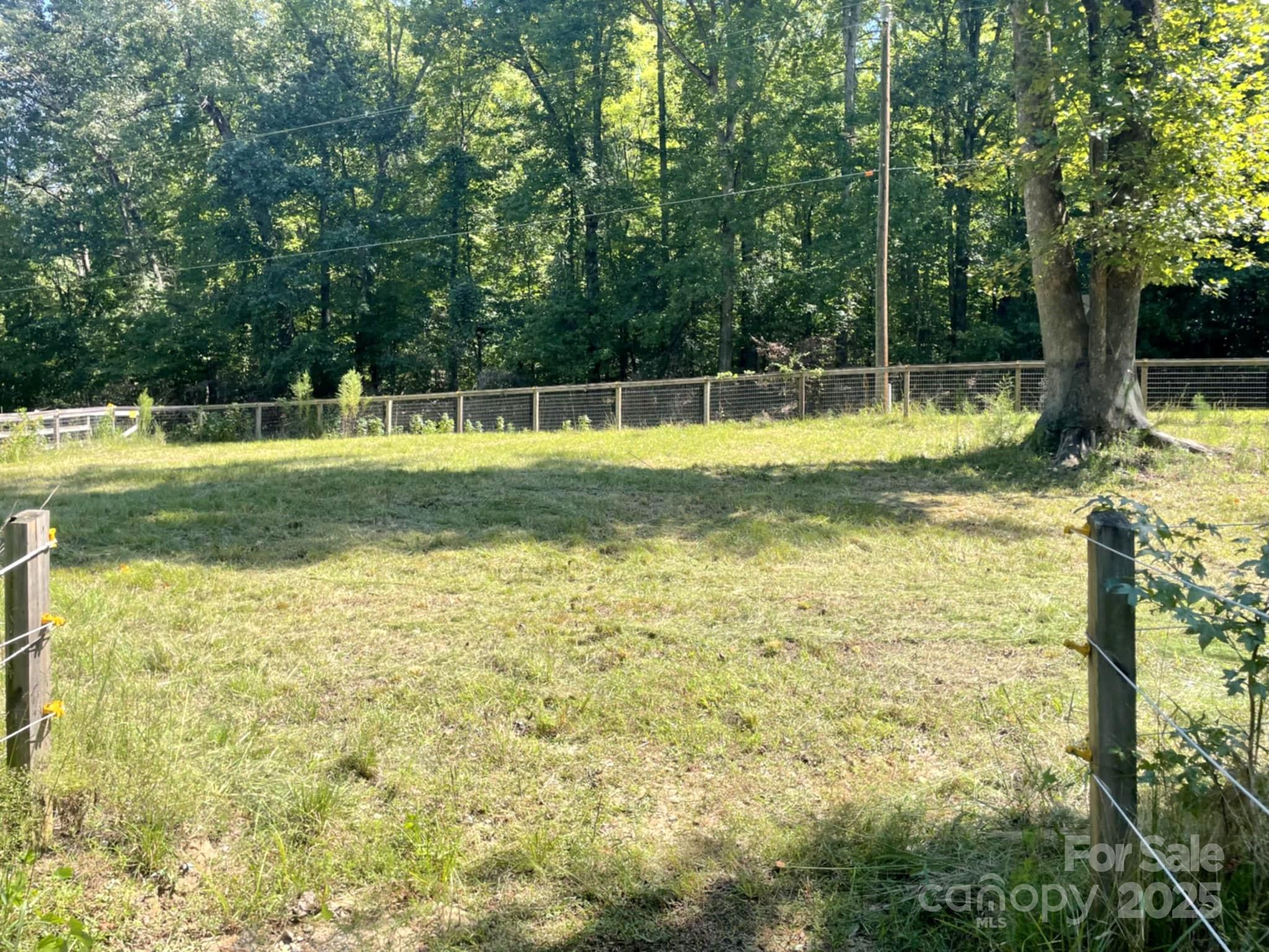 3744 Hunting Country Road Tryon, NC 28782 - Photo 32 of 34 a view of a swimming pool with a big yard
