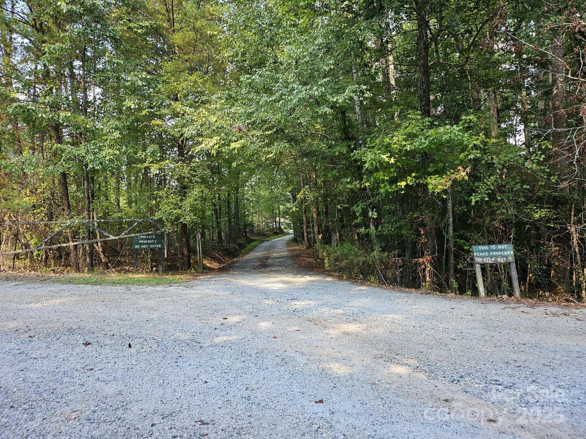 3744 Hunting Country Road Tryon, NC 28782 - Photo 33 of 34 a view of basketball area with trees in the background