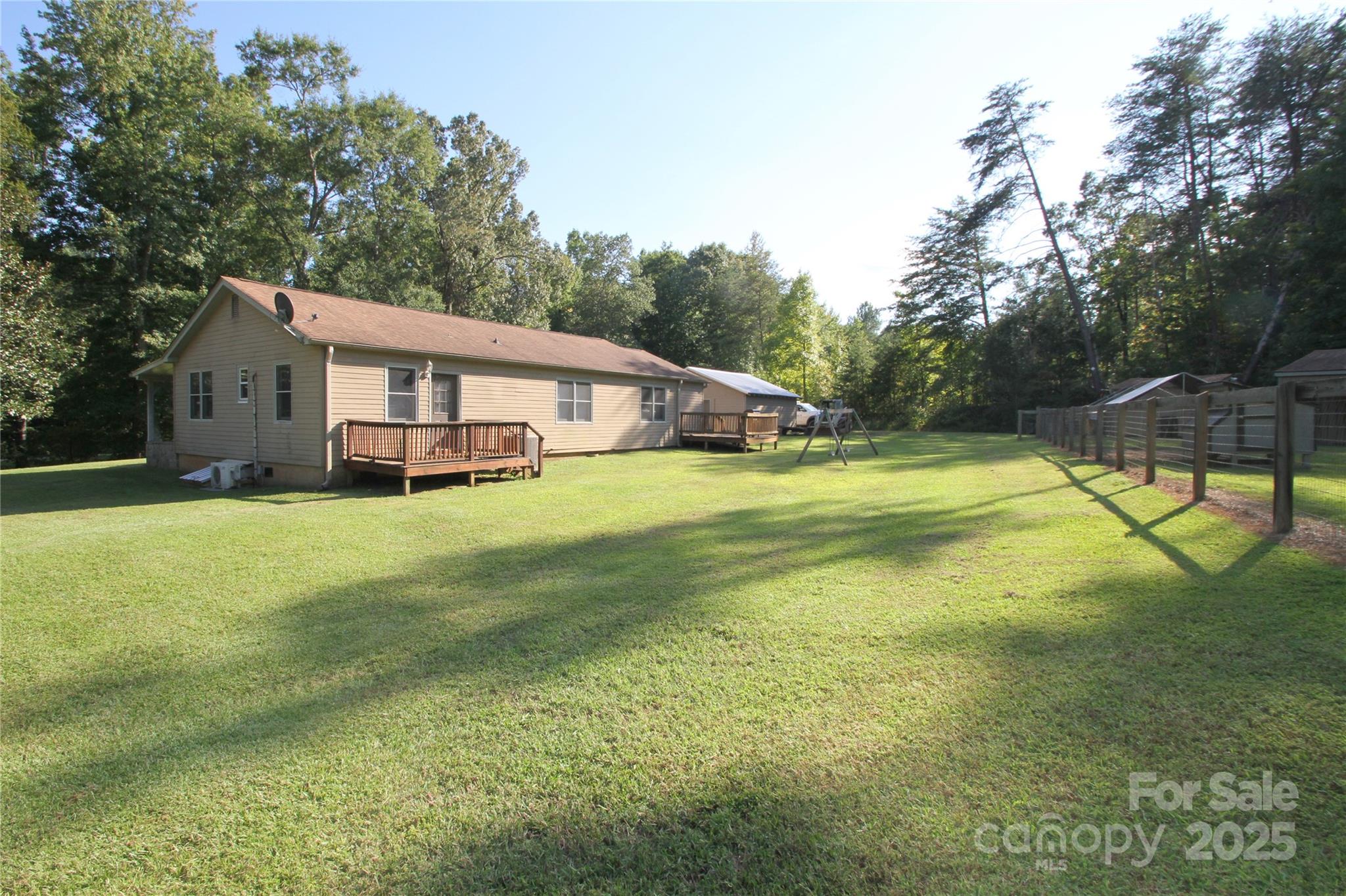 3744 Hunting Country Road Tryon, NC 28782 - Photo 4 of 34 a view of a house with a big yard