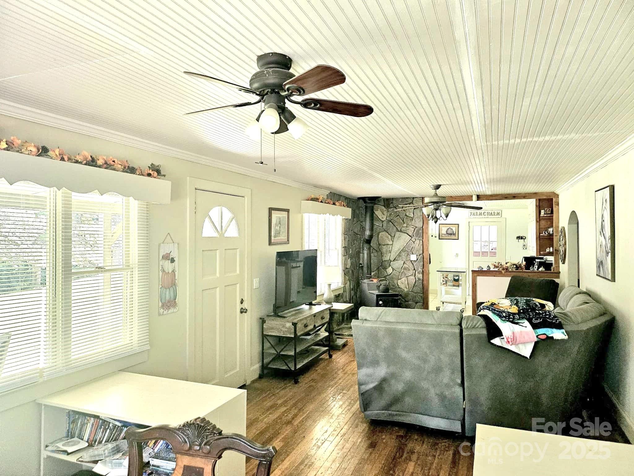 3744 Hunting Country Road Tryon, NC 28782 - Photo 10 of 34 a living room with furniture and a large window