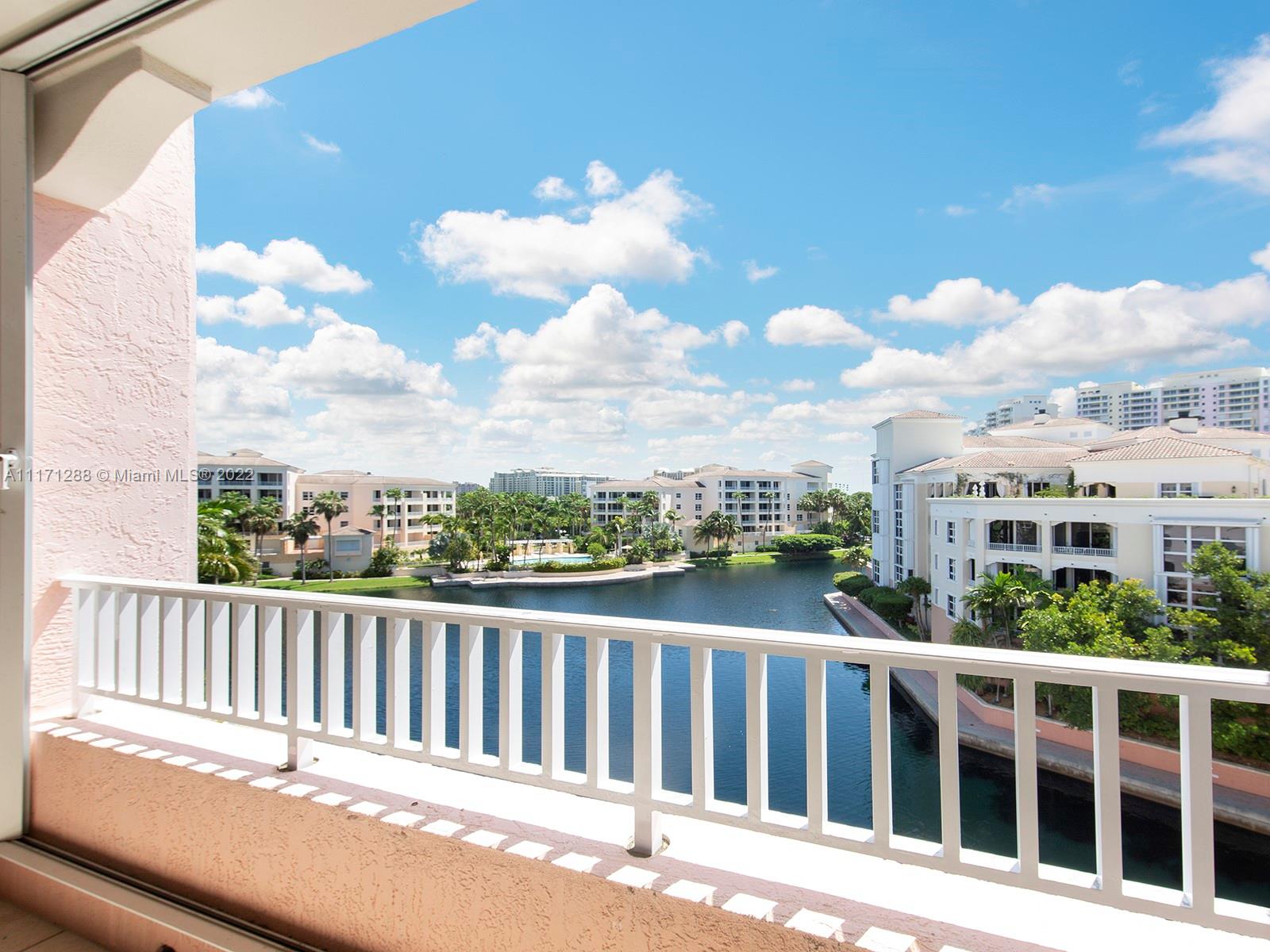735 Crandon Boulevard, Unit 503 Key Biscayne, FL 33149 - Photo 2 of 18 a view of a city from a balcony