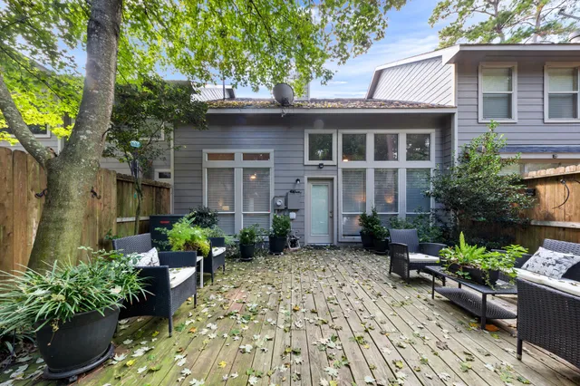 a view of a house with a yard and plants