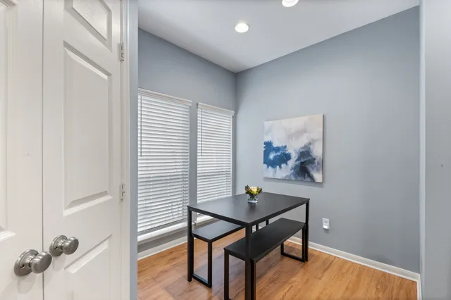 a view of a workspace with furniture