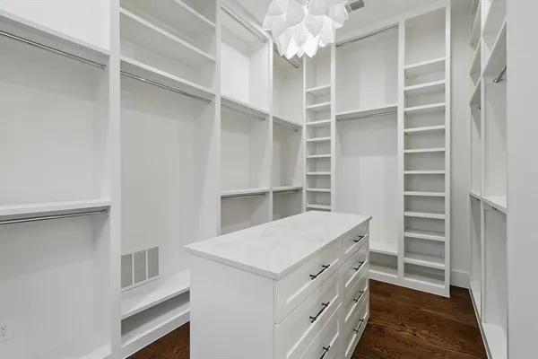 a view of an empty walk in closet