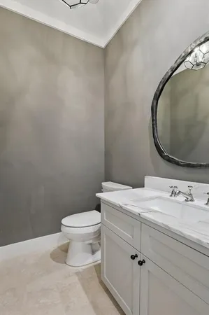 a bathroom with a sink and a toilet