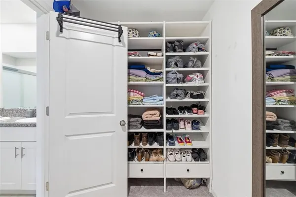 a view of a kitchen with shelf