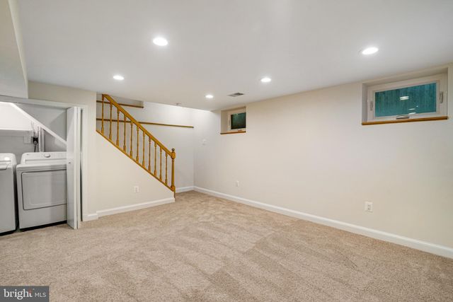 a view of a hallway with entryway