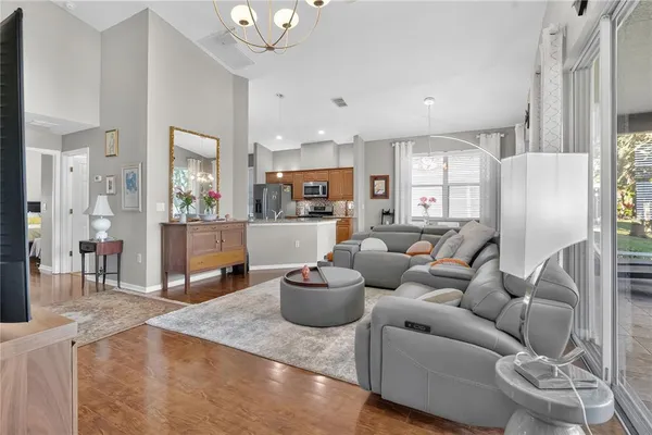 a living room with furniture and a table