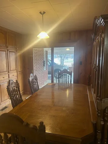 a kitchen with a sink and a refrigerator
