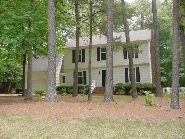 8616 Wellsley Way Raleigh, NC 27613 - Photo 1 of 1 a front view of a house with garden