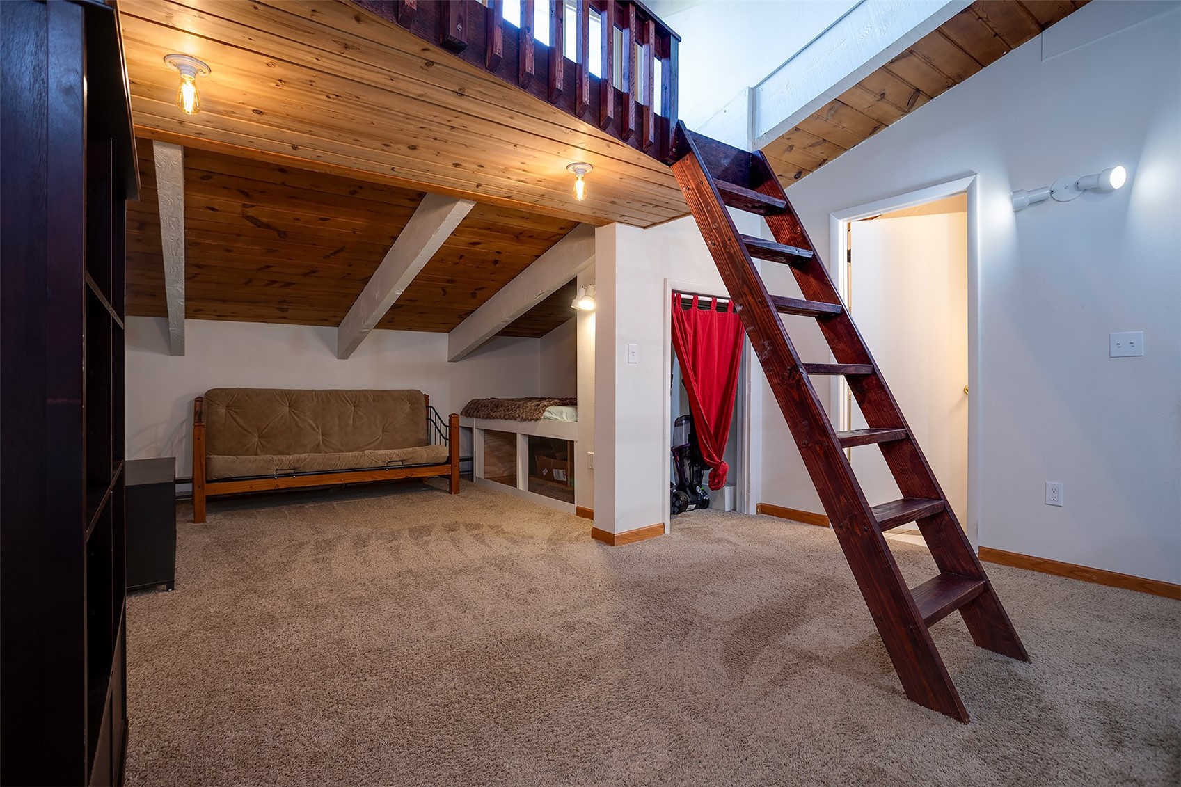 1355 Walton Creek Road, Unit 21 Steamboat Springs, CO 80487 - Photo 20 of 27 a view of an empty room with stairs