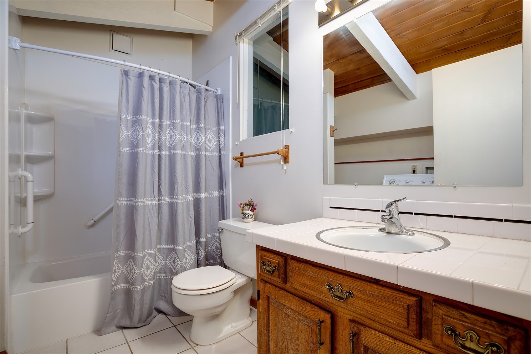 1355 Walton Creek Road, Unit 21 Steamboat Springs, CO 80487 - Photo 24 of 27 a bathroom with a sink a toilet and shower